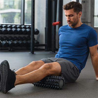 rouleau de massage du mollet chez  homme